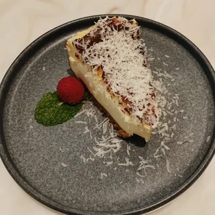 Cheesecake topped with grated Parmesan