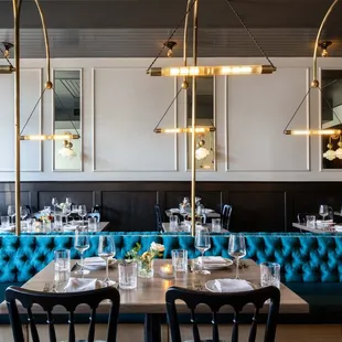 Custom Banquettes and Bespoke Lighting at Lola Dining.