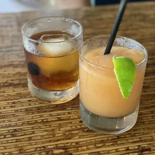 two cocktails on a table