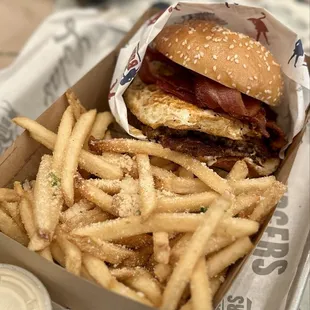 Double Smash Burger with Maple Cured Bacon &amp; Fried Egg. Garlic Truffle Fries &amp; Dijon Aioli