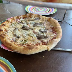 Closeup of steak and cheese pizza