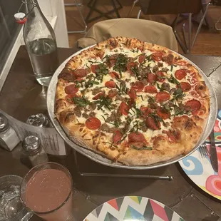 Pepperoni Sausage Fresh Garlic and basil on artisan crust!