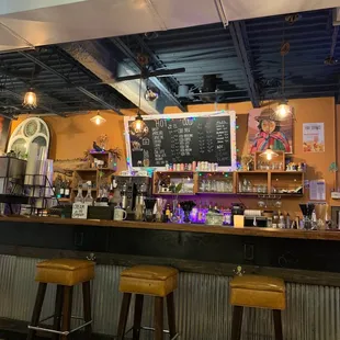 Sitting in small seating area looking at bar