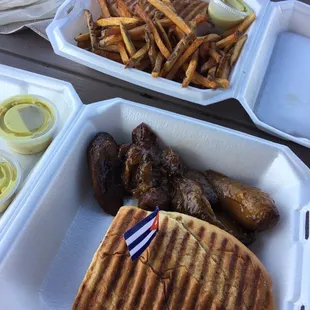 3. Cuban Sandwich (Sandwich Cubano) with fries 2. Roasted Pork Sandwich (Pan con lechn) with sweet plantains
