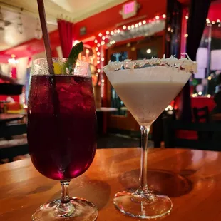 two cocktails on a table