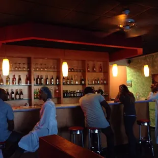 people sitting at the bar