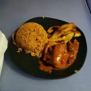 Jolaf rice and chicken with some fried plantains