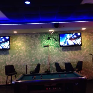 Lounge side with a pool table