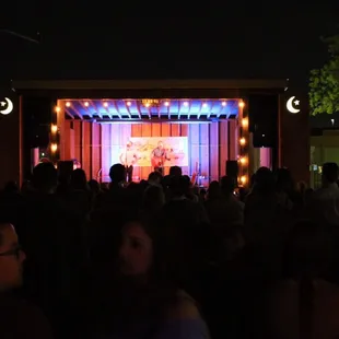 a stage with a band performing