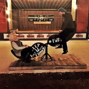 a man and a woman sitting on a bench