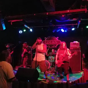 a band performing on stage