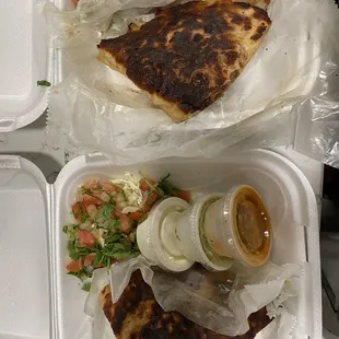 The burnt quesadillas I received from Lolis on Big Bend Road