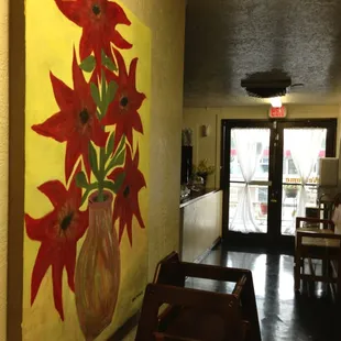 a painting of poinsettis in a vase