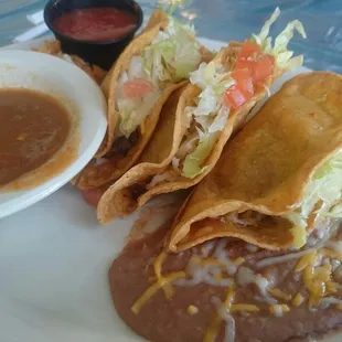 Beef and papas taco special with green chile