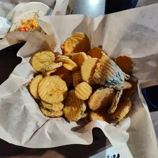 My friend and I are the two appetizers in order of fried pickles and an order of fried mushrooms out of this world