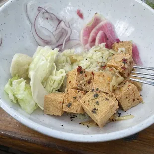 Tofu bowl (I removed a bunch of onions and all the cilantro).