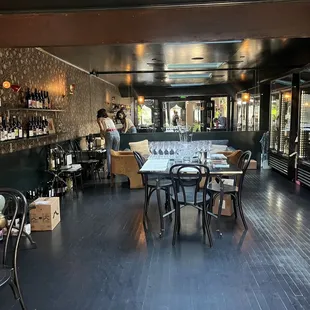 a restaurant with tables and chairs