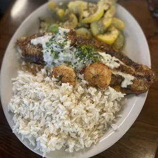 Blackened catfish white rice and sautéed zucchini
