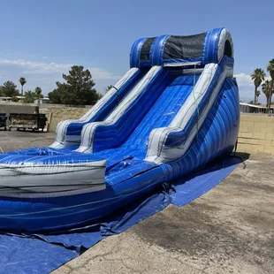 "14ft" tall water slide 28 ft long x 11 ft wide