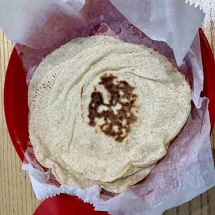 Tortilla's hecho a mano (literally hand patted). 4 with your meal. So much better than factory made.