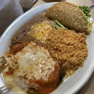 Chili relleno,crunchy beef taco with rice and beans