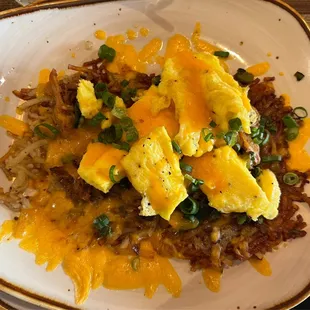 Brunch Special of the day - hash browns with pork belly, poblano peppers, eggs, cheese. Delicious!
