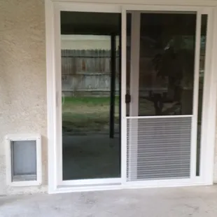 New doggie door and patio door.