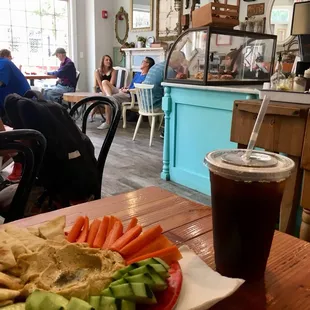 Large cold brew and hummus platter