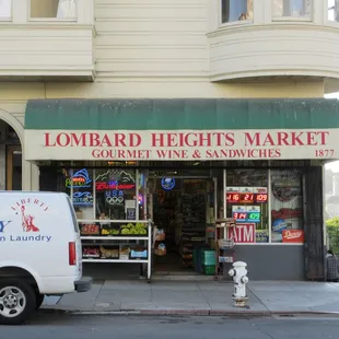 a van parked in front of the store