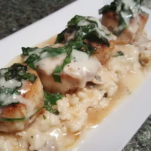 Seared Sea Scallops Florentine over a creamy mushroom risotto!