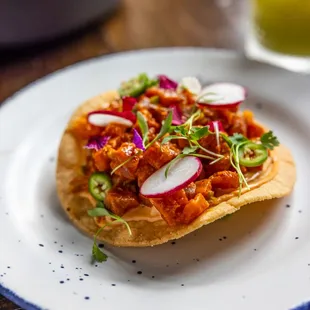 Tuna Tostada 
salsa macha / red onion / sun dried chili mayo / cilantro / avocado