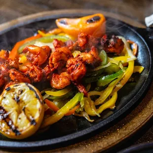 Shrimp Fajitas
onions / sweet peppers / crema / guacamole / pico de gallo / flour or corn tortillas