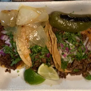 Carne asada and lengua tacos