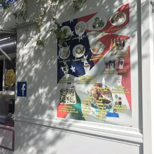 a poster on the side of a food truck