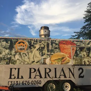 a truck with a mural on it
