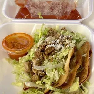 Tacos de papa..I forgot it came with pork on top lol they give you sheet tomato sauce and hot AF sauce mix them! drizzle on divine!