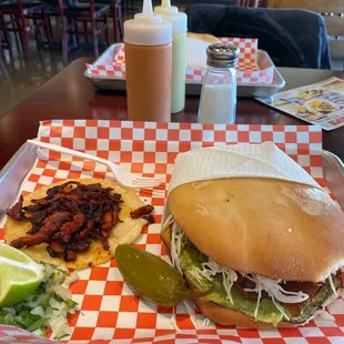 Torta de milanesa and taco de trompo.