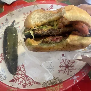 a sandwich on a paper plate