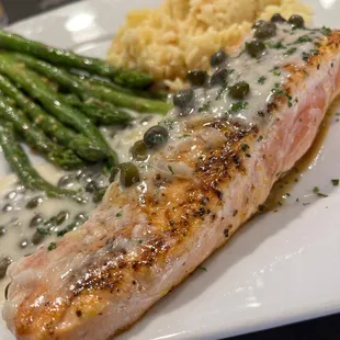 Salmon , capers , butter sauce , asparagus.