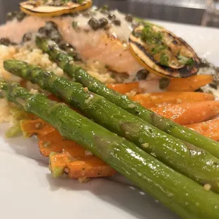 Salmon, asparagus caper butter sauce rice.