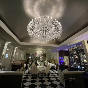 a dining room with a chandelier