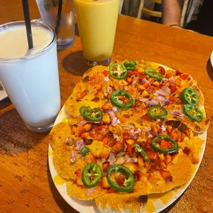 Chicken Tikka Nachos, sweet lassi, mango lassi