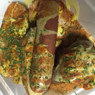 Garlic butter potatoes and a sausage