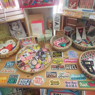 Pins, stickers,  and books