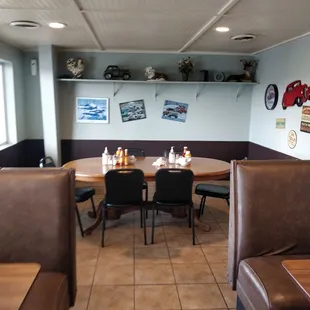 a dining area with booths and tables