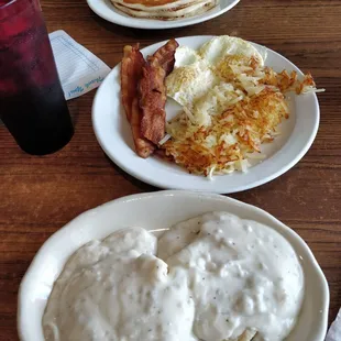 two plates of breakfast food