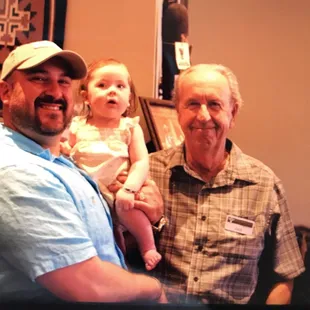 Jason, Annelise, with her first bracelet, and Jack