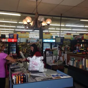 customers at the cash register