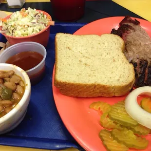 Brisket plate with beans and coleslaw.