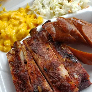 Ribs, smoked sausage, mac and cheese and coleslaw
